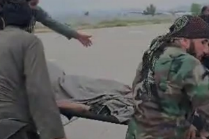 আফগানিস্তানে ভূমিকম্পে ধ্বংসস্তূপে পরিণত ঘরবাড়ি এবং শোকার্ত মানুষ।