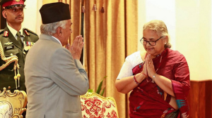 নেপালের অন্তর্বর্তী প্রধানমন্ত্রী সুশীলা কার্কি ও প্রেসিডেন্ট রাম চন্দ্র পাওদেলের নির্বাচনের তারিখ ঘোষণার দৃশ্য।